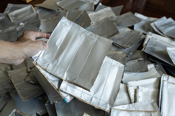 Milk carton packages collected for recycling.