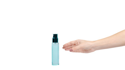 Face cream in glass bottle with dispencer. Blue container.