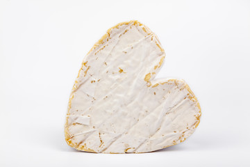french cow's milk cheese called Neufchâtel  isolated on white background