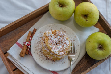 home made sweet apple pancakes with sugar and cinnamon