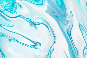 Acrylic marble background in soft turquoise color.