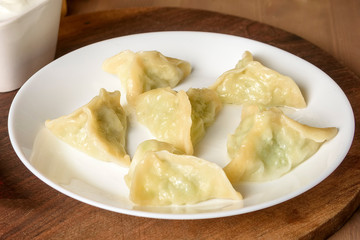 Homemade dumplings - Russian dumplings. Meat dumplings, ravioli. Dumplings with stuffing.