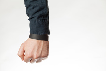 Black event mockup bracelet on hand. Personal wristband on adhesive paper. Ticket.