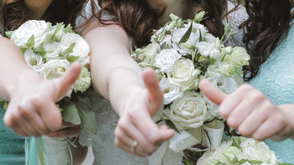 Women showing thumb up