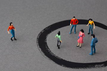 miniature woman outside and people in circles - Powered by Adobe