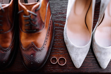 bride and groom shoes, wedding rings