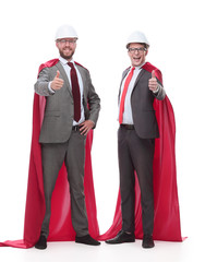 in full growth. two super architects showing thumbs up.