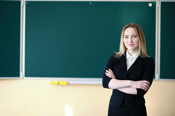 Young teacher in school class