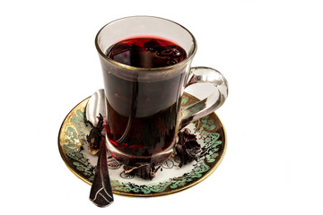 Hot tea isolated on white, hibiscus tea, place for text.