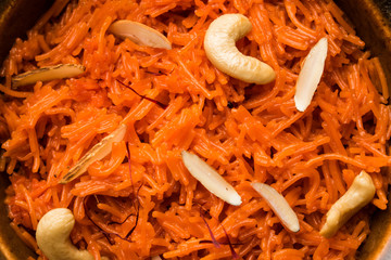 Vermicelli  / Semiya Kesari is a popular indian sweet served in a bowl, garnished with dry fruits like cashew and almond, made in pure ghee