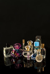 Perfume still life on a dark background.