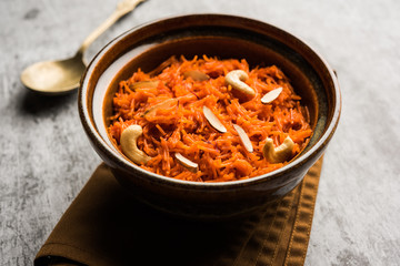 Vermicelli  / Semiya Kesari is a popular indian sweet served in a bowl, garnished with dry fruits like cashew and almond, made in pure ghee