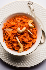 Vermicelli  / Semiya Kesari is a popular indian sweet served in a bowl, garnished with dry fruits like cashew and almond, made in pure ghee