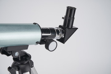 It's a small but portable blue telescope on a white background