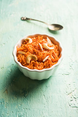 Vermicelli  / Semiya Kesari is a popular indian sweet served in a bowl, garnished with dry fruits like cashew and almond, made in pure ghee