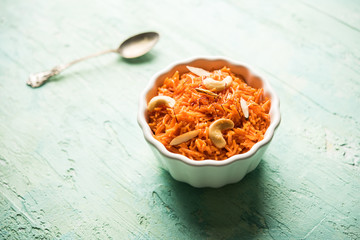 Vermicelli  / Semiya Kesari is a popular indian sweet served in a bowl, garnished with dry fruits like cashew and almond, made in pure ghee