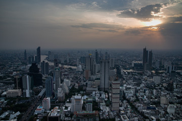 Naklejka na ściany i meble panoramic skyline of Bangkok at sunset from King Power Mahanakhon, Bangkok, Thailand