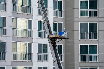 Ladder truck used for moving in service, especially for high-rise apartment building in South Korea