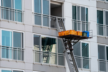 Ladder truck used for moving in service, especially for high-rise apartment building in South Korea