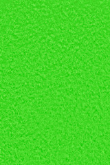 Green foam background, abstract polyurethane texture close-up