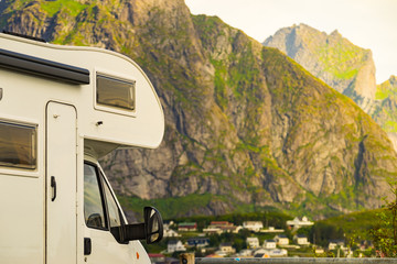 Camper car on fjord, Lofoten Norway