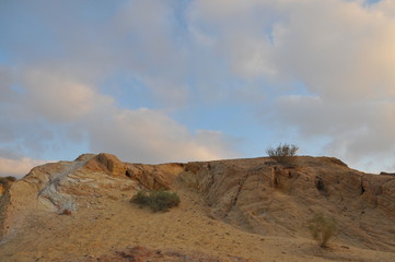 Desert landscape at sunrise. Hiking desert part of Israel National Trail. Negev desert . Valley. Colorful sands 