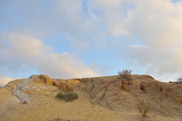 Desert landscape at sunrise. Hiking desert part of Israel National Trail. Negev desert . Valley. Colorful sands 
