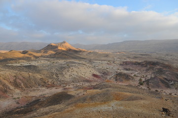 Desert landscape at sunrise. Hiking desert part of Israel National Trail. Negev desert . Valley. Colorful sands 