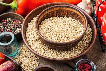 Green buckwheat on wooden table