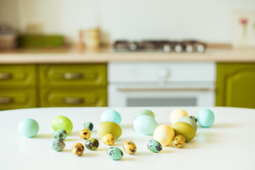 Easter eggs on a white wooden surface