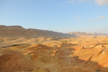 Desert landscape at sunrise. Hiking desert part of Israel National Trail. Negev desert . Valley. Colorful sands 