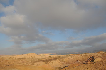 Desert landscape at sunrise. Hiking desert part of Israel National Trail. Negev desert . Valley. Colorful sands 