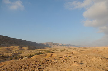 Desert landscape at sunrise. Hiking desert part of Israel National Trail. Negev desert . Valley. Colorful sands 