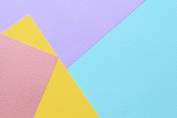 Abstract geometric water color paper background in soft pastel trend colors. Pastel color block background.