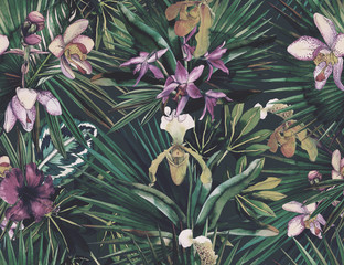Tropical seamless pattern with tropical flowers, banana leaves. Round palm leaves, watercolor painted orchids. © Арина Трапезникова