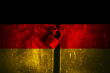 German flag and padlock. Padlock on the background of the German flag.