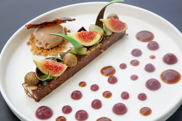 Fancy modern dessert on the white tray, Exquisite dish, creative restaurant meal concept, haute couture food	