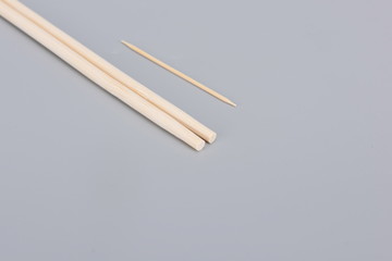Disposable chopsticks in gray background