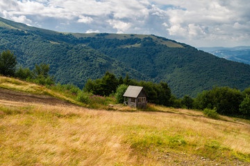 Fototapeta na wymiar small summer house in the mountains