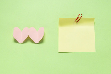 A yellow note on a green background