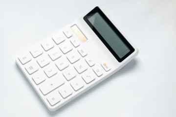 A calculator on the table.