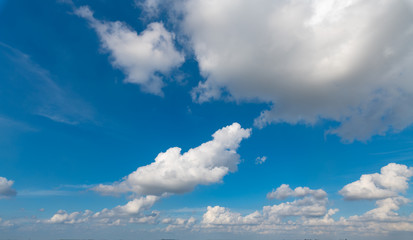 A blue sky with white clouds