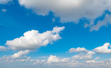 A blue sky with white clouds