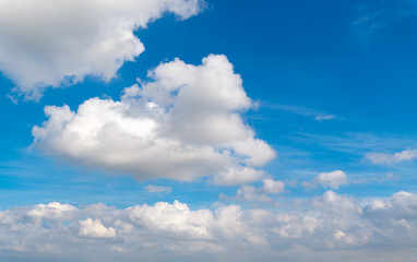 A blue sky with white clouds