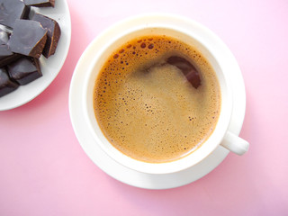 cup of coffee with chocolate pieces