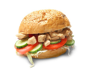 Tasty doner kebab in bun on white background