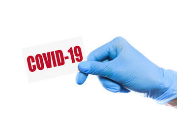 doctor holding a word  virus COVID-19 . Anti COVID-19 vaccine concept - Image