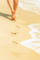 Woman walking on the beach
