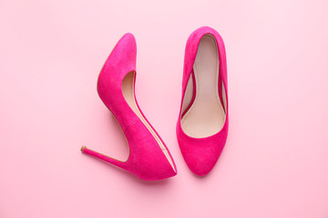 Stylish female shoes on pink background - obrazy, fototapety, plakaty