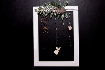 Fototapeta premium White wooden frame photo on back background.